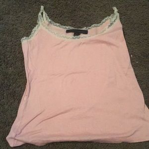 A nice pink tank top and has cool designs.